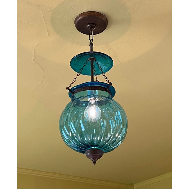 Stunning teal blue blown glass swirl pendant, newly electrified and ready to install to your ceiling j box. Canopy and...