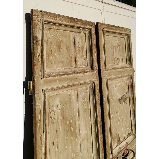Portone brings two 700 -era doors with four squares seared and frame on the front, while the behind is smooth. To be...