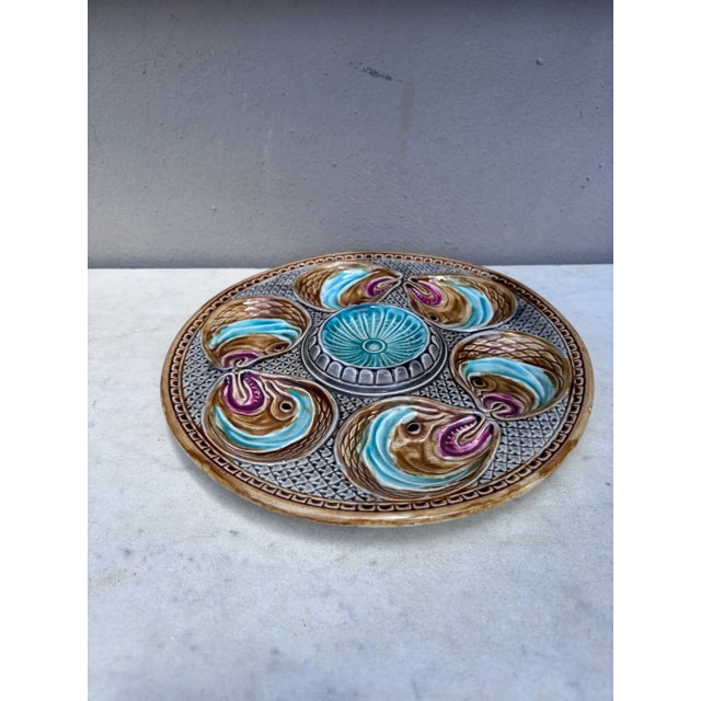 Rare 19th century Majolica fish heads oyster plate from North of France (Onnaing unsigned). Reference: Page 130...