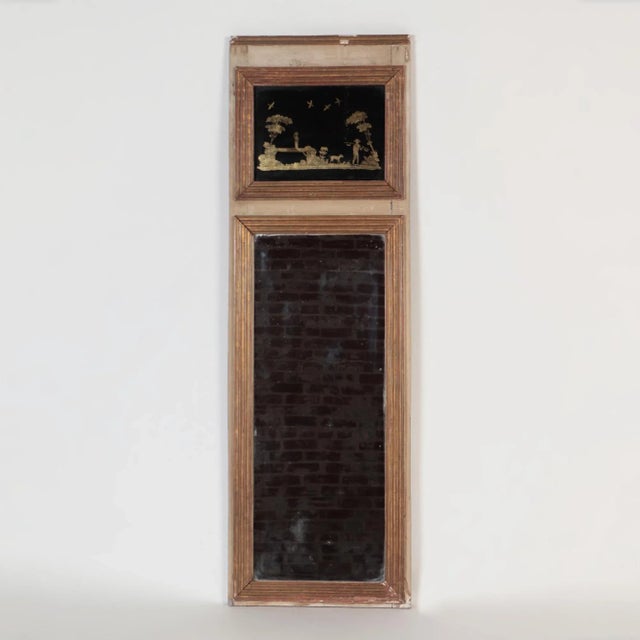 A French painted and carved Trumeau mirror, 19th C.