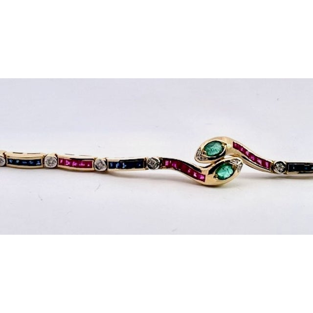 Boho Chic Vintage Yellow Gold Snake Bracelet With Emeralds, Rubies, and Diamonds For Sale - Image 3 of 13
