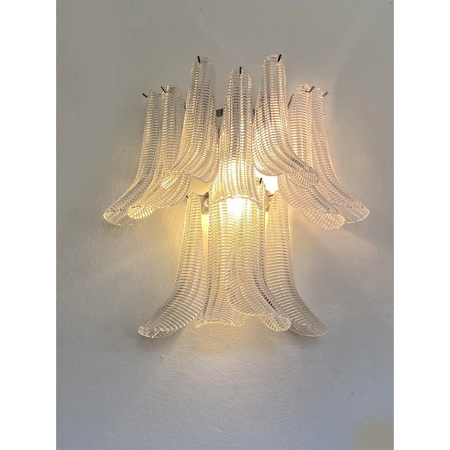Lot of 4 of Murano Glass transparent diamanted "Selle" wall sconces . All made in Italy, made in Murano glass. “Selle”...