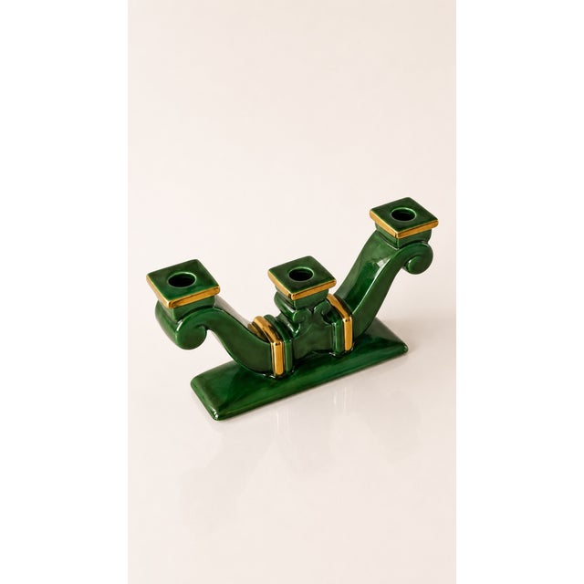 A ceramic art candlestick from Saint-Clément, with a sculptural design inspired by Art Deco. Beautiful deep green glaze...