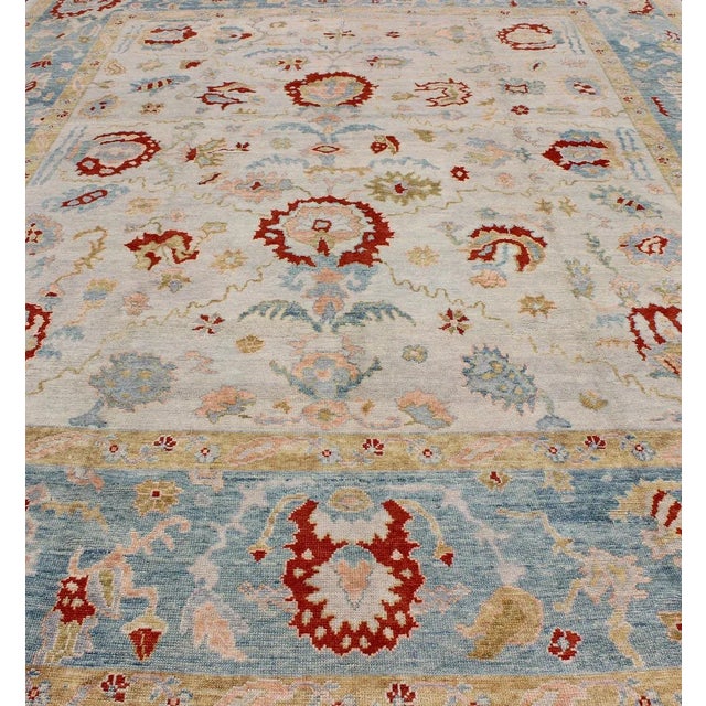 2010s Large Angora Oushak Turkish Rug With All Over Design in Light Blue, Ivory & Red For Sale - Image 5 of 13