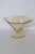 This lovely Pedestal Footed Bowl is made of depression glass. This beautiful bowl has a wonderful yellow color to the...