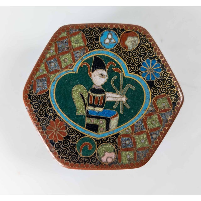 We are selling this nice late 19th or early 20th century Japanese cloisonne enamel box. This box has hexagon shape with a...