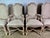 Set of (8) French Louis XV style dining chairs in a bleached walnut wood. The chairs are newly upholstered in a washed...