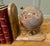 A Set of Bookends for the Geography Student A very attractive pair and clever design, the ends are made with small globes...
