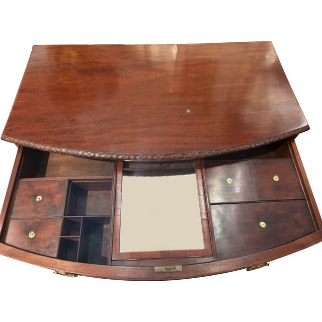 Discover the elegance of the late 18th century with this exquisite George III mahogany chest of drawers, circa 1780. This...