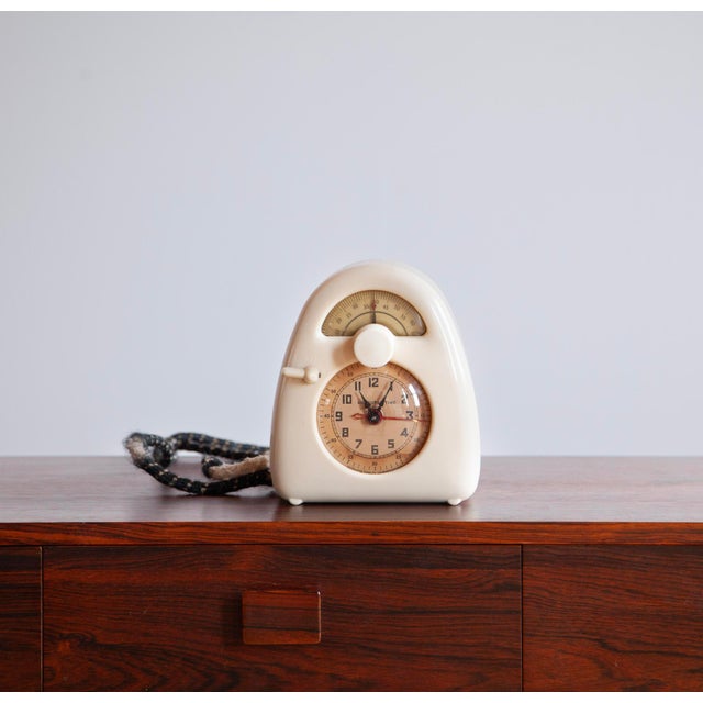 We are very pleased to present this *genuinely rare* Isamu Noguchi Measured Time Clock and Kitchen Timer. This clock marks...