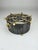 A rare, high-quality tea warmer that reflects the modern elegance of its era through the contrast of black perforated...