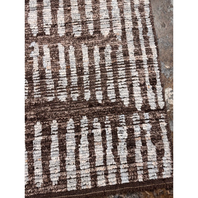 Design Plus Gallery presents the 6ft × 8ft 5in Esma Hand Knotted Wool Area Rug from Restoration Hardware. Graduated lines...