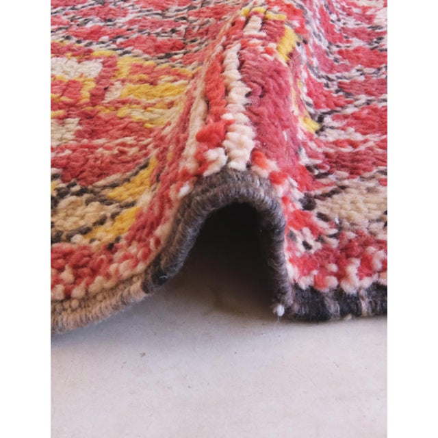 Vintage Moroccan Beni Mguild Rug – Crimson Heritage & Artisan Geometry A masterpiece of Moroccan textile art, this vintage...