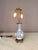 Antique blue and white pattern porcelain lamp with ornate design brass base Two brass Edison sockets in working condition...