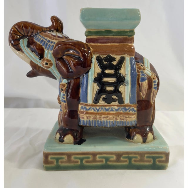 Charming vintage ceramic elephant statue that has been hand painted in the most appealing color palette, including shades...