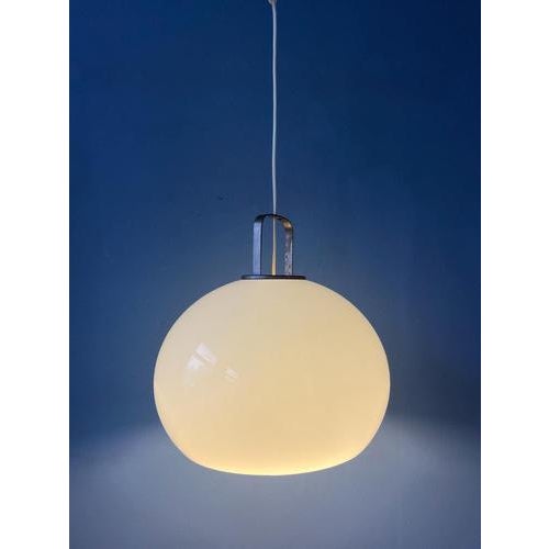 White acrylic glass mushroom pendant lamp. The mushroom shade is made out of acrylic glass and produces a warm, cosy...
