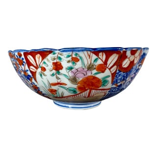 Antique Scalloped Rim Imari Bowl Decorated With Vibrant Floral Patterns in Shades of Pink, Orange & Red From Japan - Circa 1920 For Sale