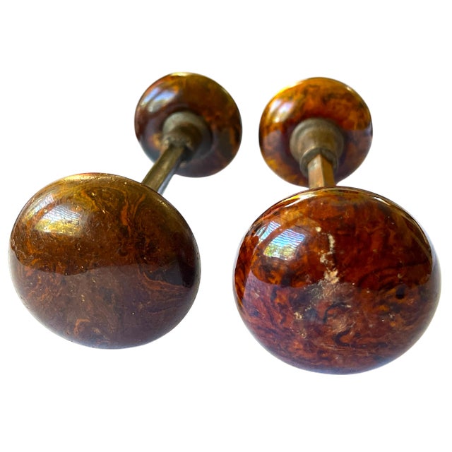 Add authentic 19th-century craftsmanship to your home with this handsome pair of antique Bennington ceramic door knobs....