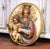 This striking antique religious wall plaque was crafted in Spain circa 1870 and depicts the Madonna and Child in high...