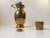 This is a vintage solid brass thermos with a screw-in lid, swivel handle, and a fitted exterior cup. It will work as a...
