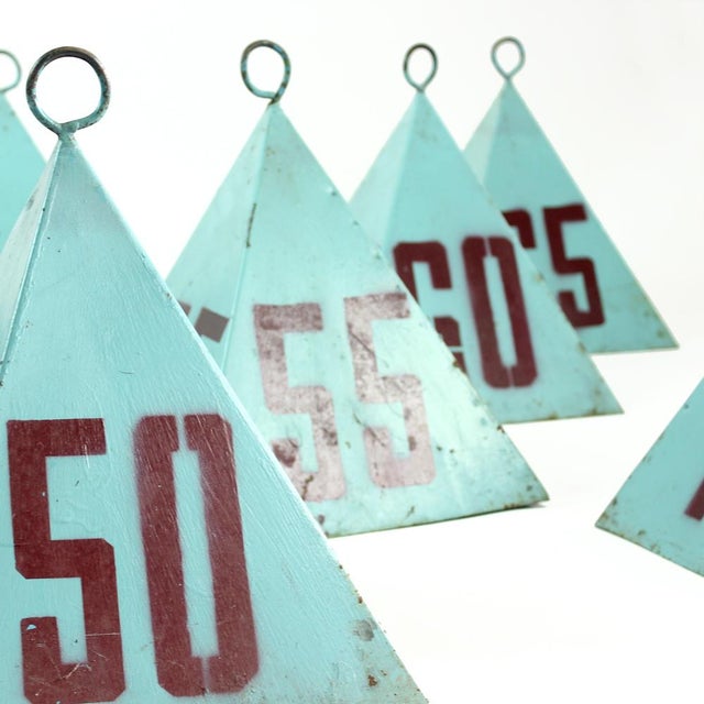 Striking set of nine vintage steel pyramids, originally used to mark distances on a javelin and ball throwing field in...