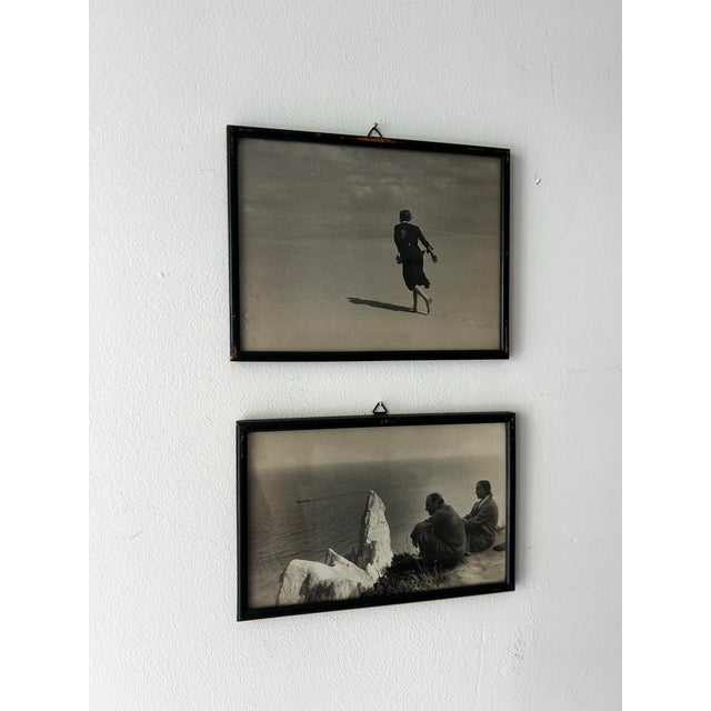 Moving, inspiring, mysterious real photographic images of a couple experiencing the cliffs and beach. The clothing...