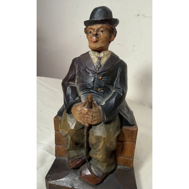 This rare early 20th century antique hand carved wood German whistler sculpture is a unique and charming collectible piece...