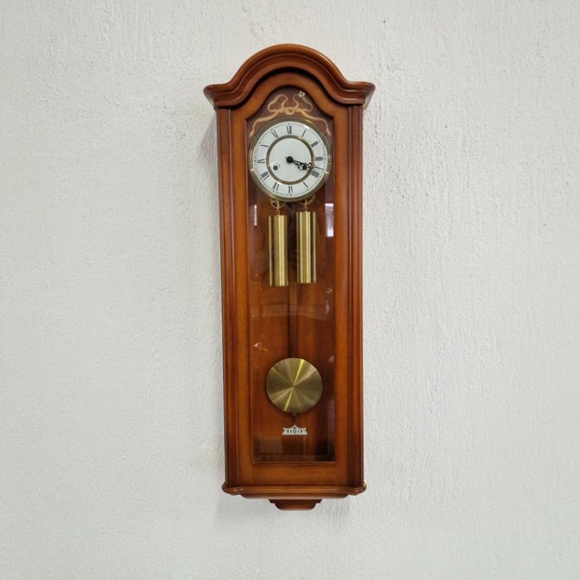 German wall clock with a classic and elegant design, made with attention to detail and watchmaking traditions. The body is...