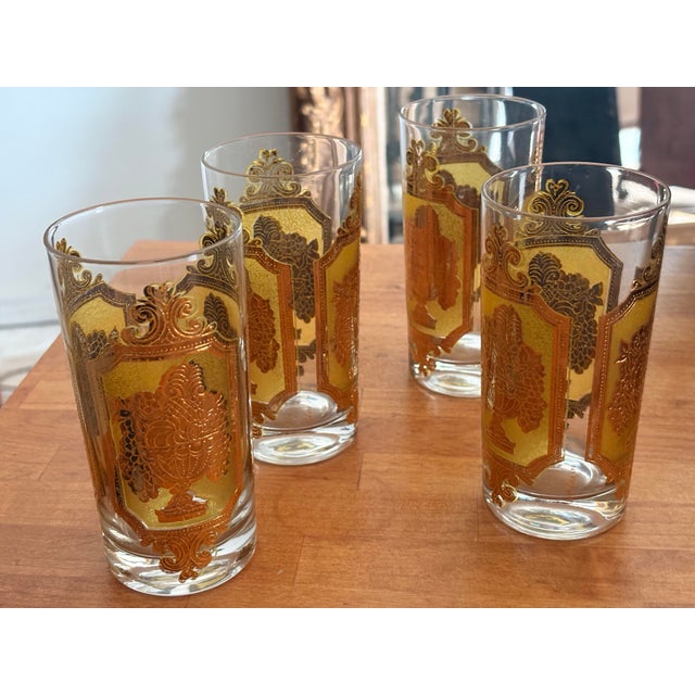 Set of 4 vintage mid-century modern highball glasses by Culver Ltd., featuring an intricate 22k gold and textured...