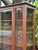 1930s Antique 1930s Mahogany Glass-Front Curio Cabinet With Geometric Detailing & Turned Legs For Sale - Image 5 of 6