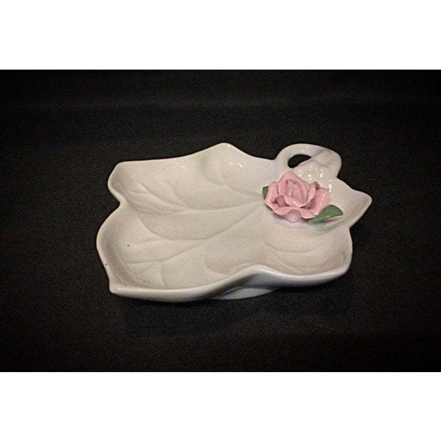 Enhance your space with this beautiful small trinket dish or paperweight, featuring a delicate ceramic rose. Its charming...