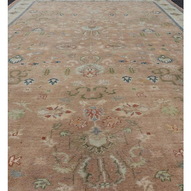 Turkish Mid 20th Century Colorful Turkish Oushak Rug in Salmon Background With All-Over Floral Design For Sale - Image 3 of 13