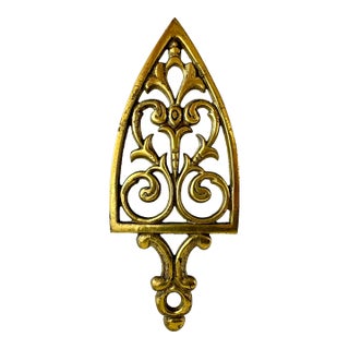 Vintage Mid Century Japan Brass Trivet With Scroll and Shield Motif For Sale