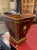 This Antique French Mahogany and Brass French Empire Style Waste Basket exudes elegance and sophistication. With its...