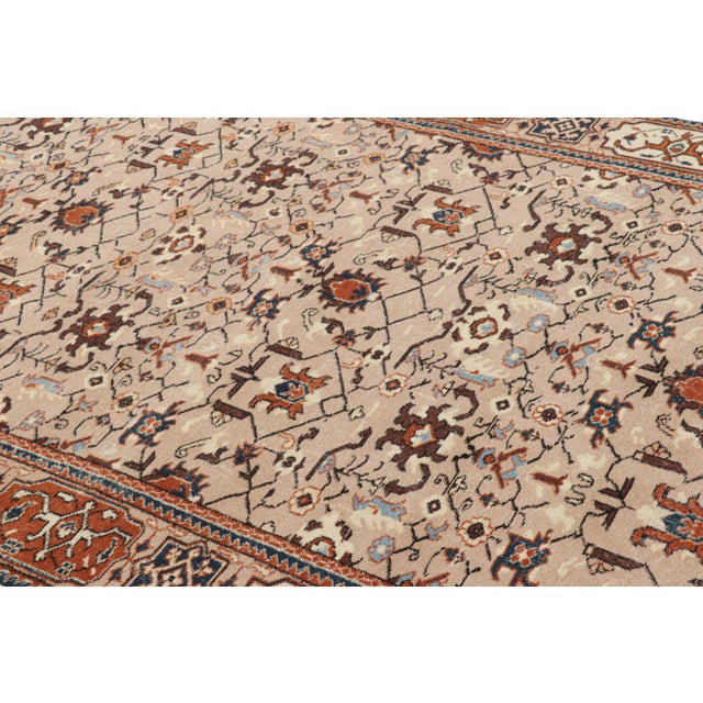 Hand-knotted in wool, this 6x10 vintage rug originating from Turkey, circa 1950-1960, is a very special piece, featuring a...