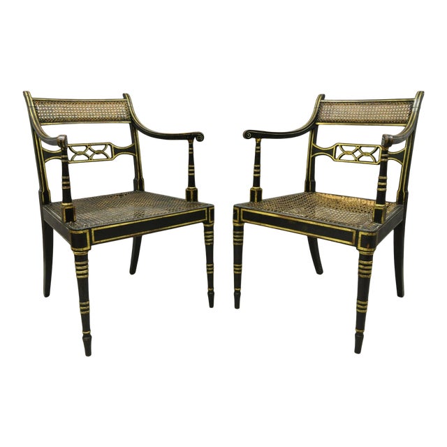 Antique English Regency Black and Gold Ebonized Cane Arm Chairs - a