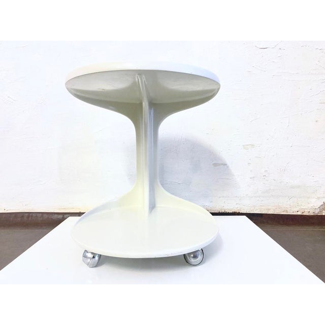 Used side table (tea trolley) on casters from the 1960s/70s. White plastic. Good used condition. Minor scratches on the...