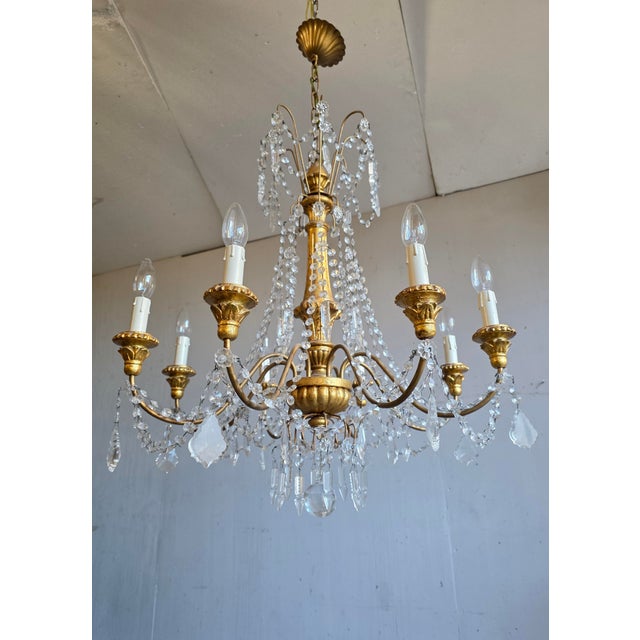Genoese Festival Chandelier in Gilded Wood and Crystals, 1950s, in Very Good conditions. Designed 1950 to 1959 Up to 250V...