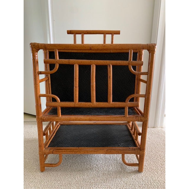 Rattan and burnt bamboo magazine. Contrasting black painted rattan on the sides and bottom. Heavy and very structurally...