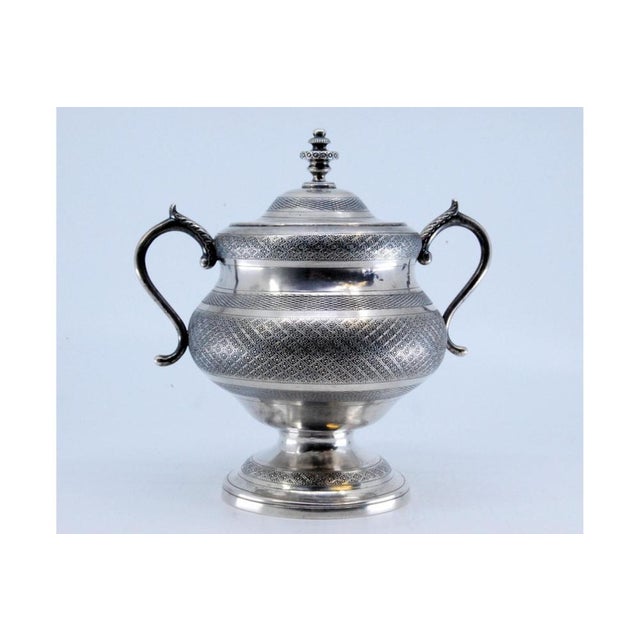 Silver Sugar Bowl with Guilloche Diamond Engravings, in Very Good conditions. Designed before 1890 This piece has an...
