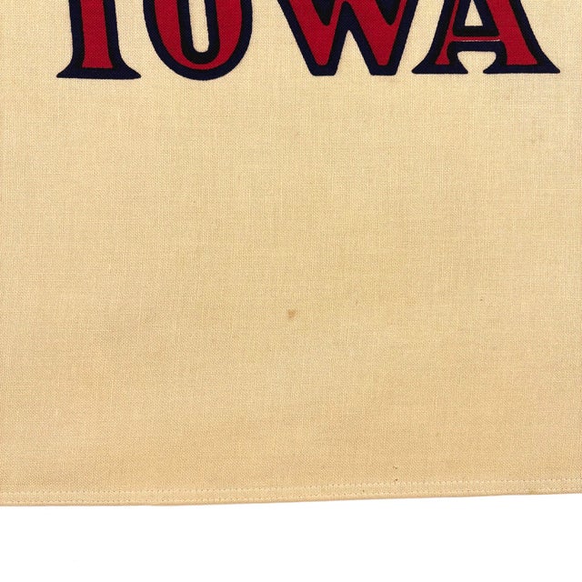 This vintage Iowa flag is sewn from a cotton cloth, while blue panel only is a soft polyester with similar look and feel....