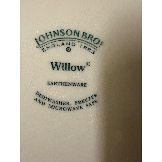 Offering this pair of vintage 1990s Johnson Brothers, “Willow” pattern 10,75” plates. These plates are in displayed only...