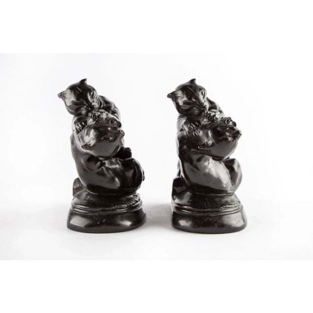 Exceptional pair of early 20th C. grappling mountain lion bookends. Produced by Kronheim and Oldenbusch these are...
