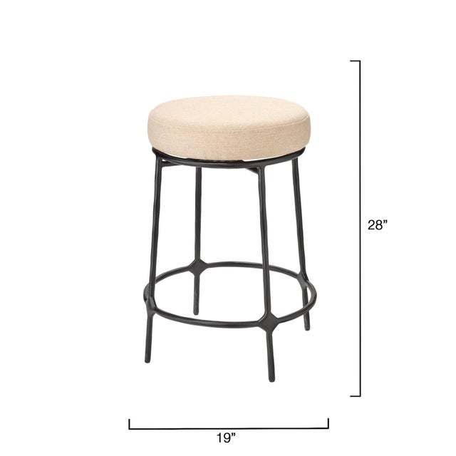 With its hand-forged iron base and softly upholstered seat, this stool brings timeless elegance and comfort to any kitchen...