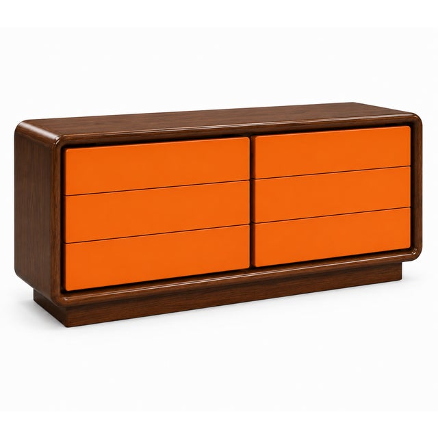Stunning post modern waterfall front 6 drawer long dresser, circa 1980. The dresser was refinished by our shop....