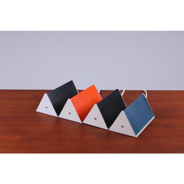 Striking set of 4 metal anvia wall sconces model ‘7013’ produced during the fifties and sixties. The design is by j.j.m....