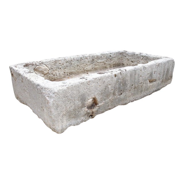 A Wide 18th Century Carved Limestone Trough From the South of France For Sale