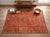A vintage handwoven Maimana kilim from northern Afghanistan, overdyed in a warm terracotta. Maimana, in Faryab province,...