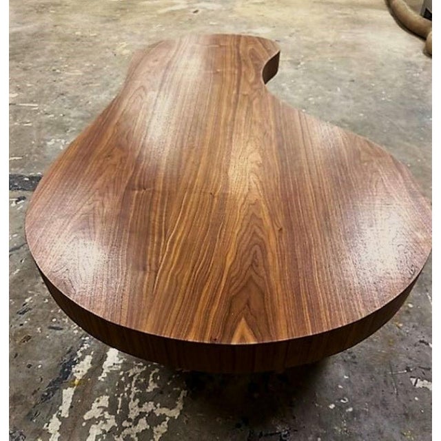 The Amibe Coffee Table is a great design for any interior concept. Produced of a solid oak frame and finished in a walnut...