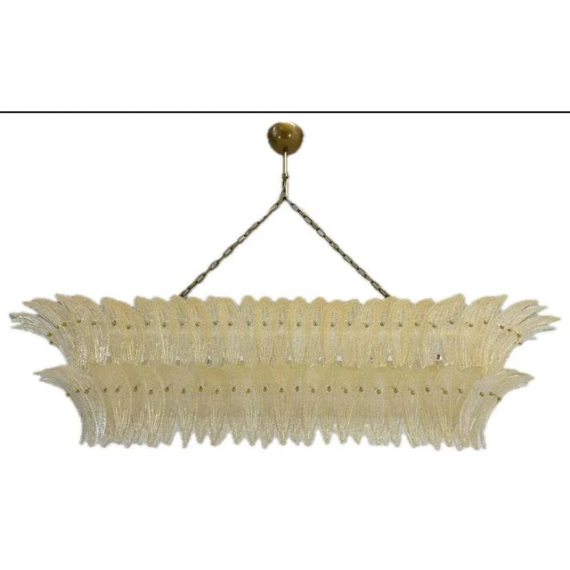 Stunning Italian Murano Palmette chandelier composed of 136 amber glass leaves, each handcrafted by skilled Venetian...